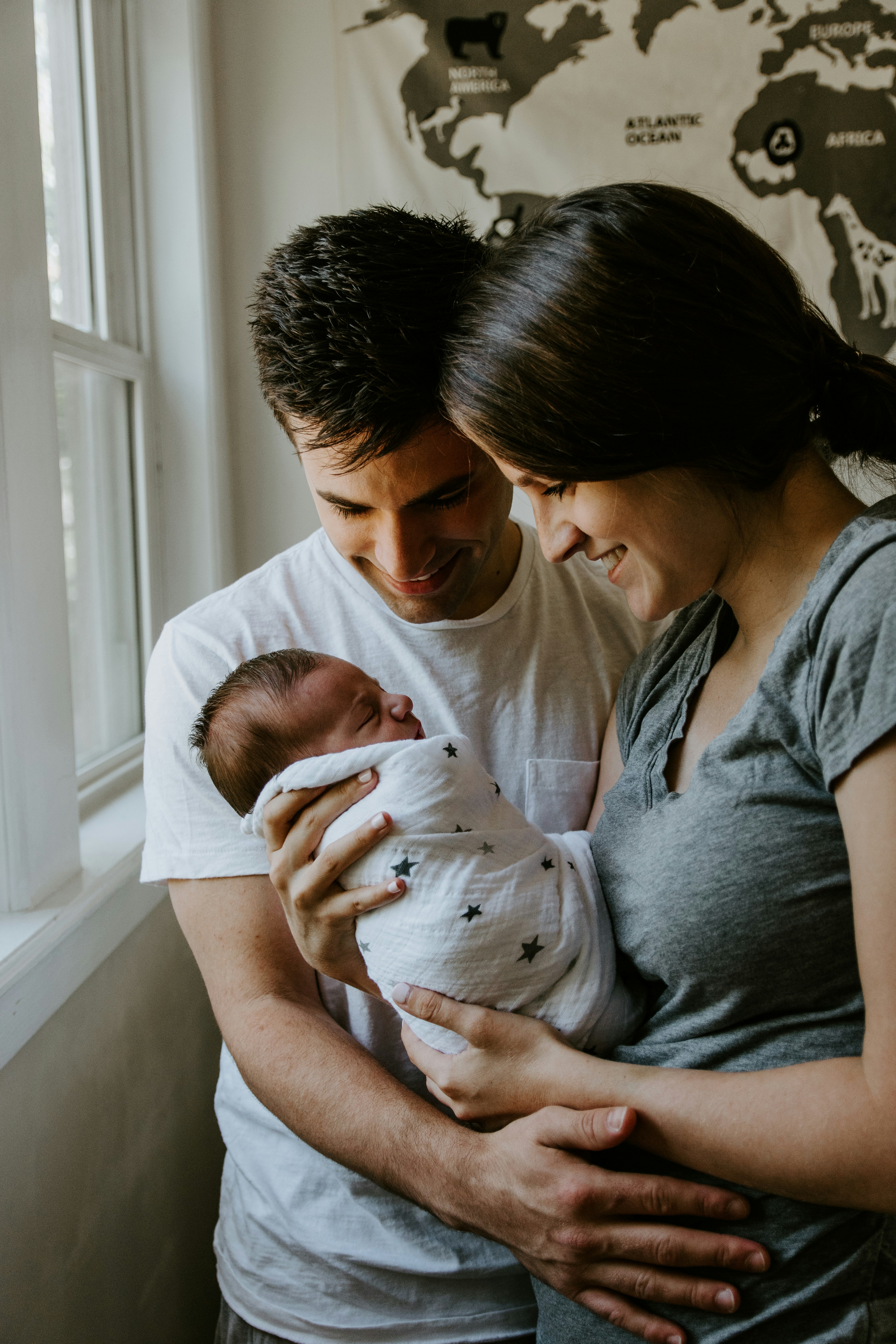 picture of family holding baby